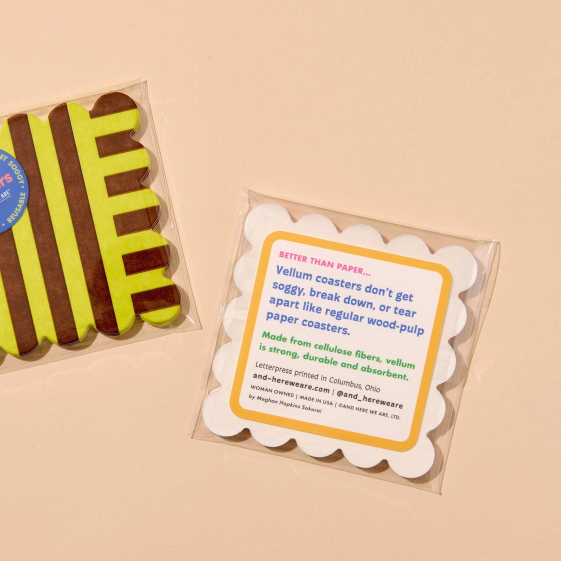 Packaged vellum coasters with a descriptive card on a beige background