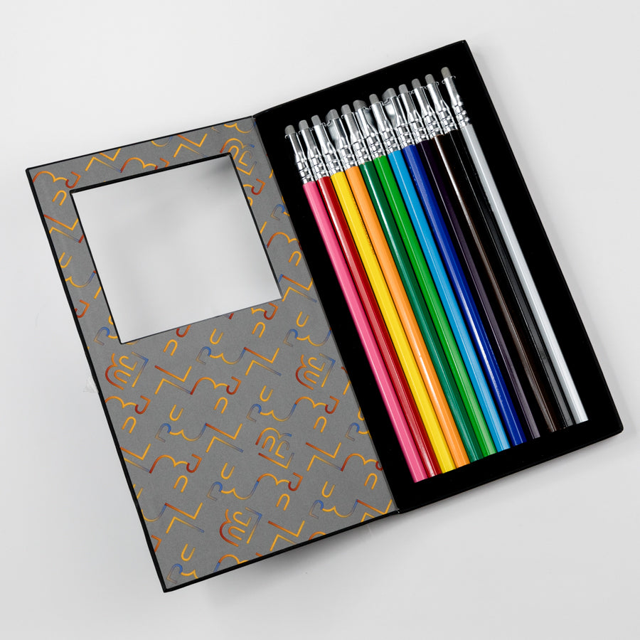 Set of colored pencils in a decorative lined case