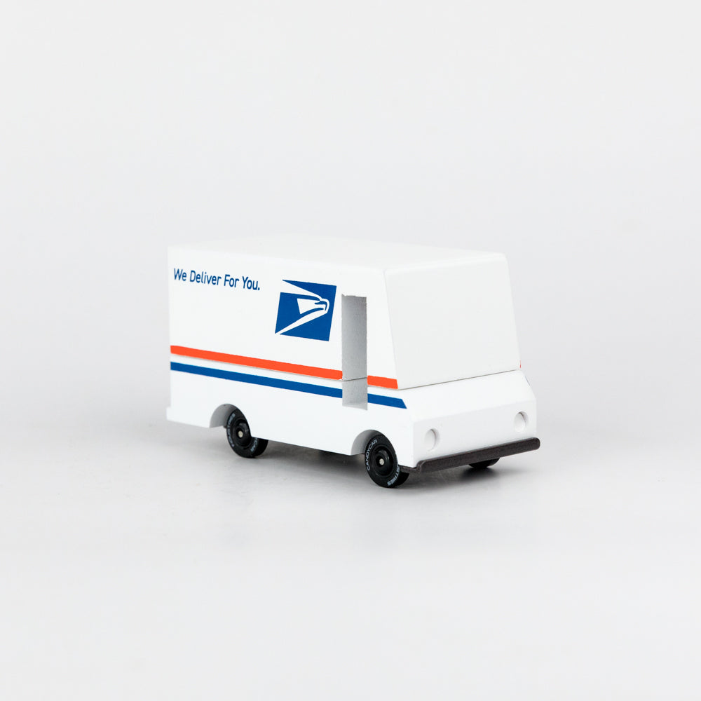 Model of a postal delivery truck with USPS logo on a white background