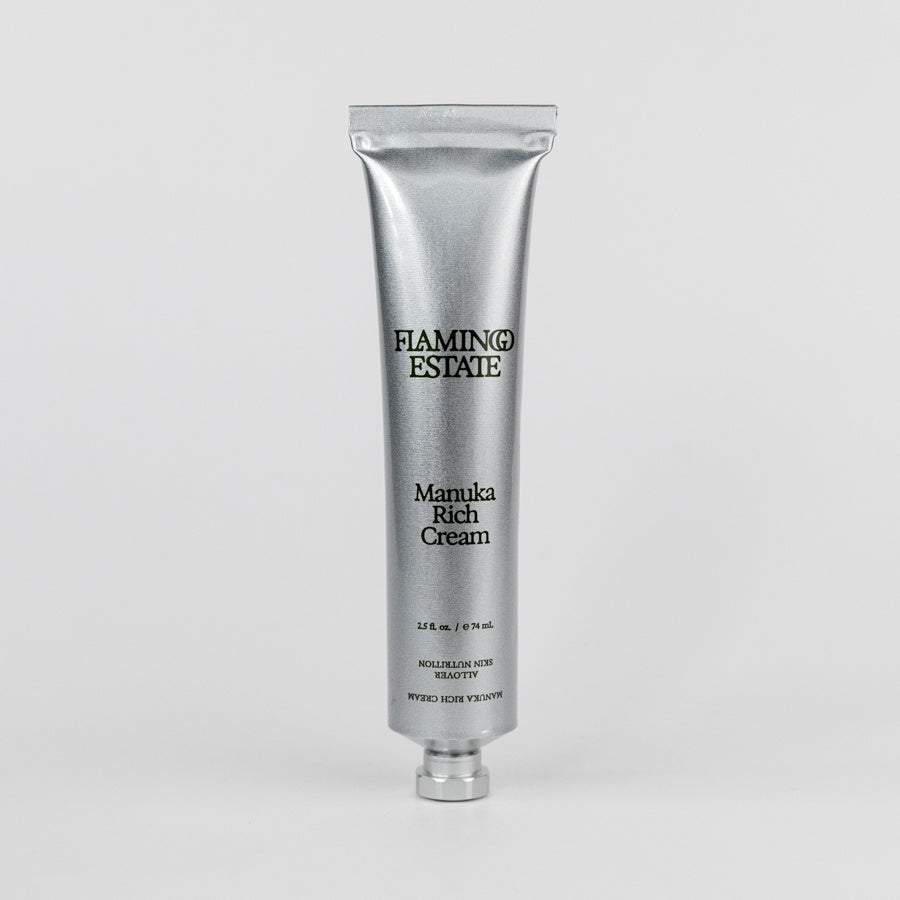 Silver tube of Flaming Estate Manuka Rich Cream on a white background