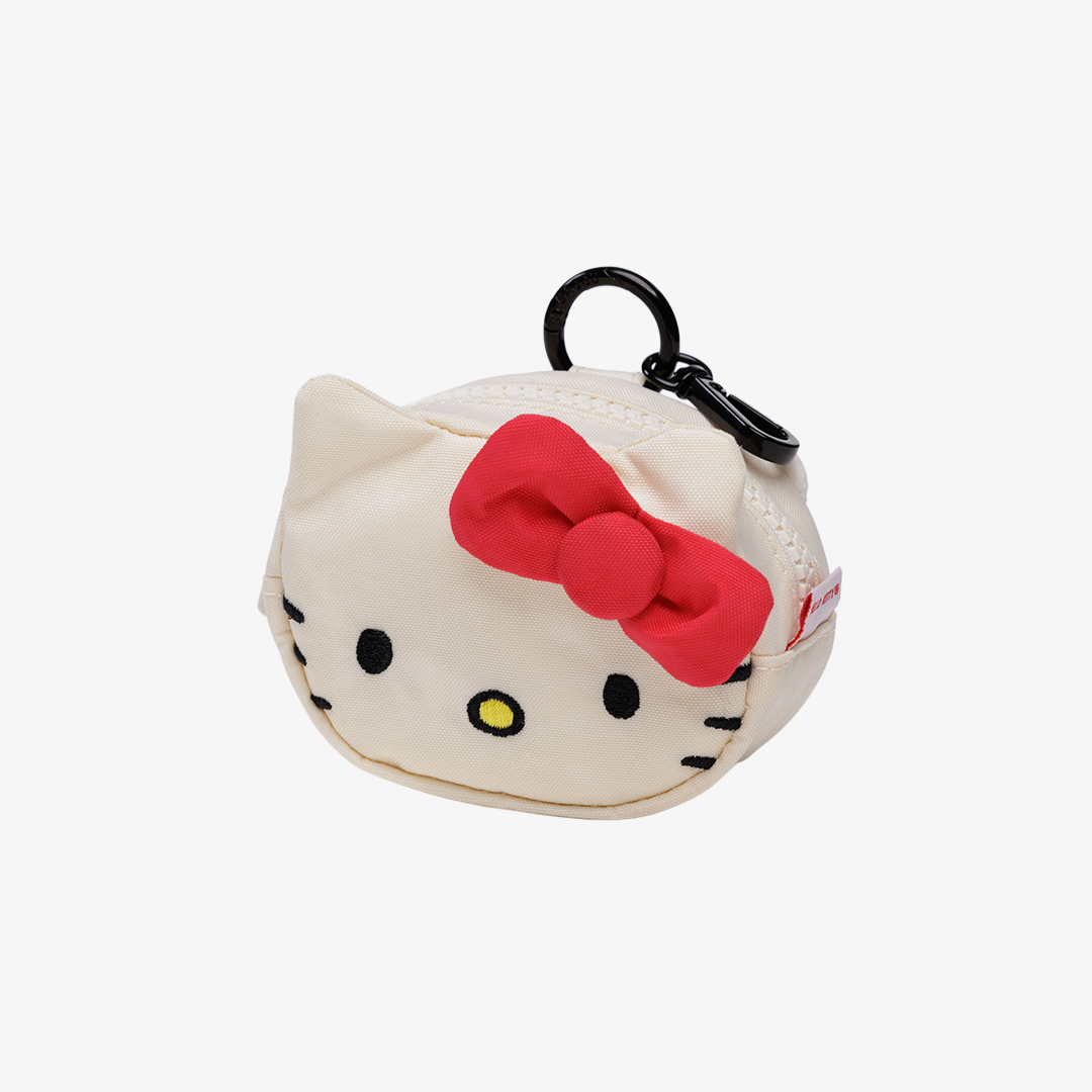 Hello Kitty-shaped zipper pouch bag charm with a red bow on a white background