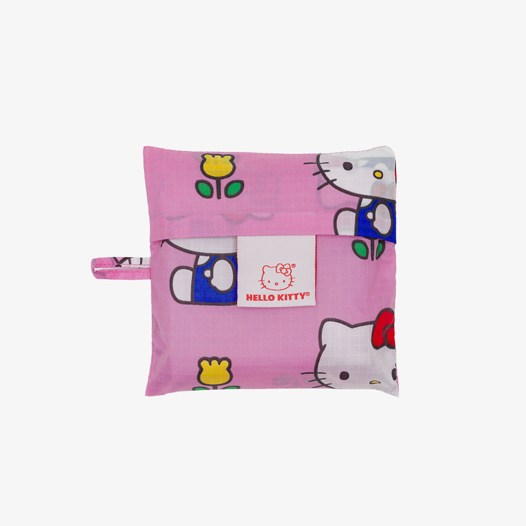 Pink pouch with Hello Kitty design on a white background