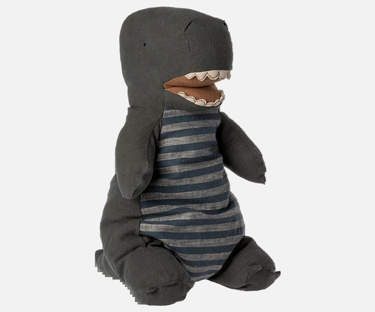 Stuffed dino toy with a striped body on a white background