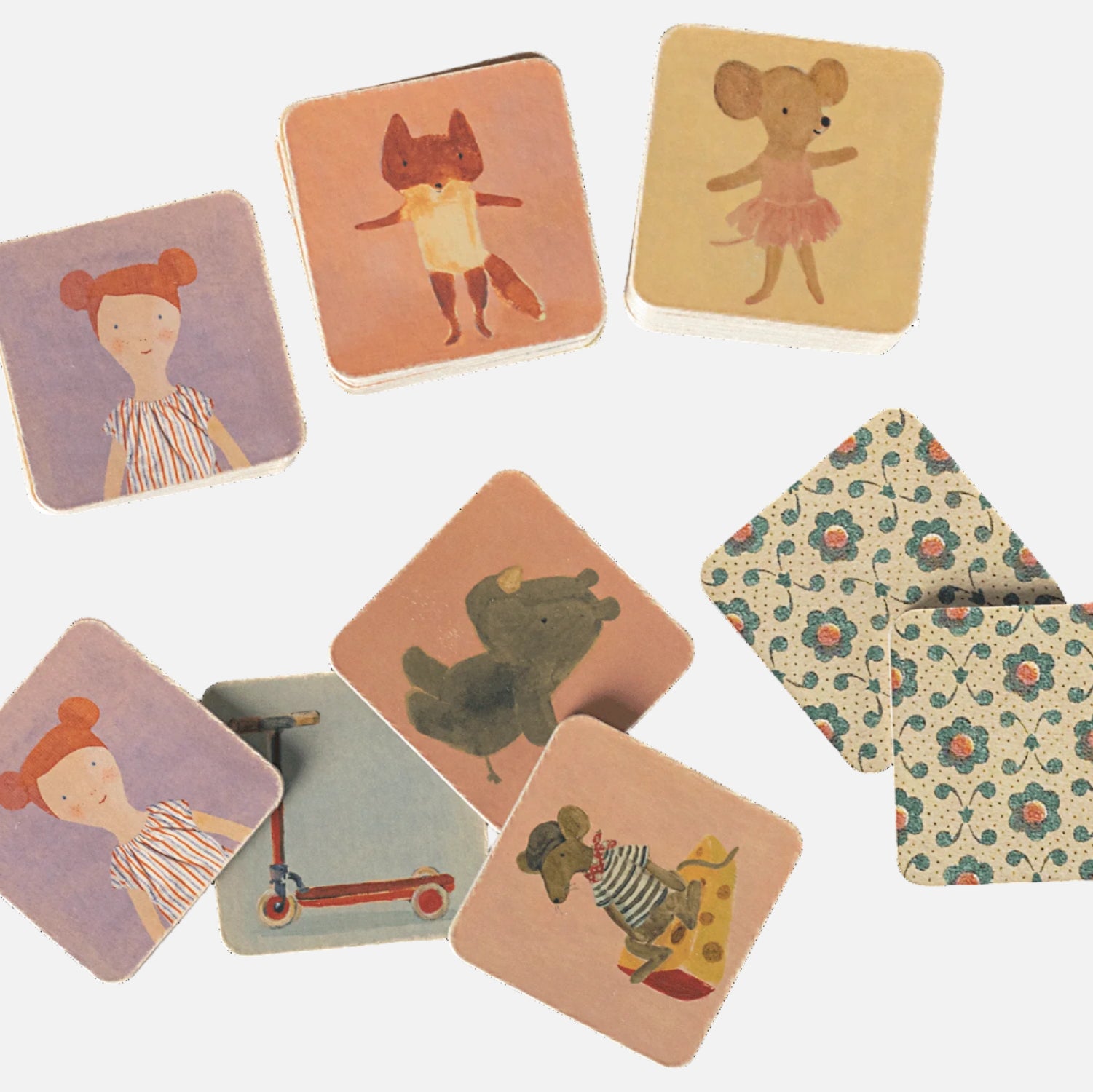 Set of square tiless with animal and character illustrations on a white background