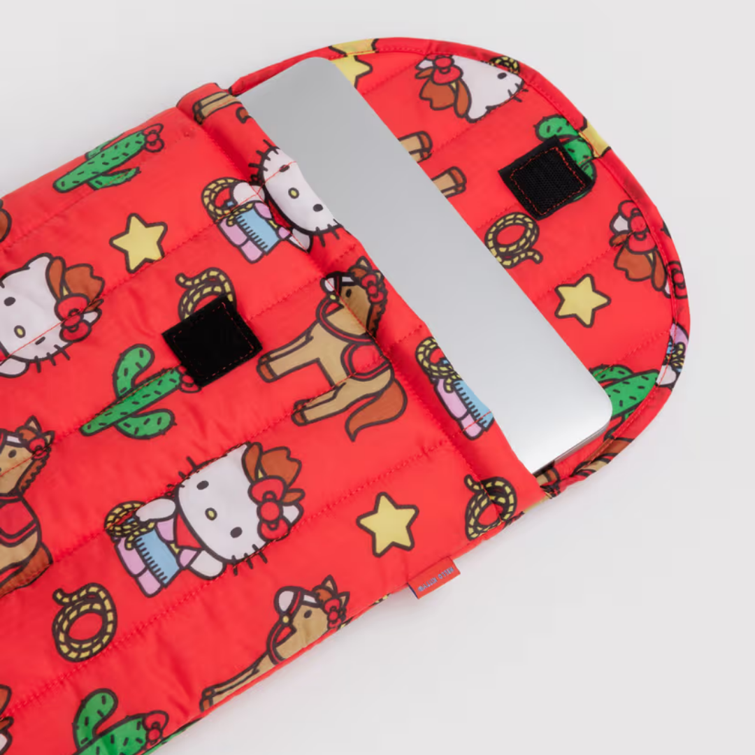 Red pouch with Hello Kitty and horse pattern on a white background