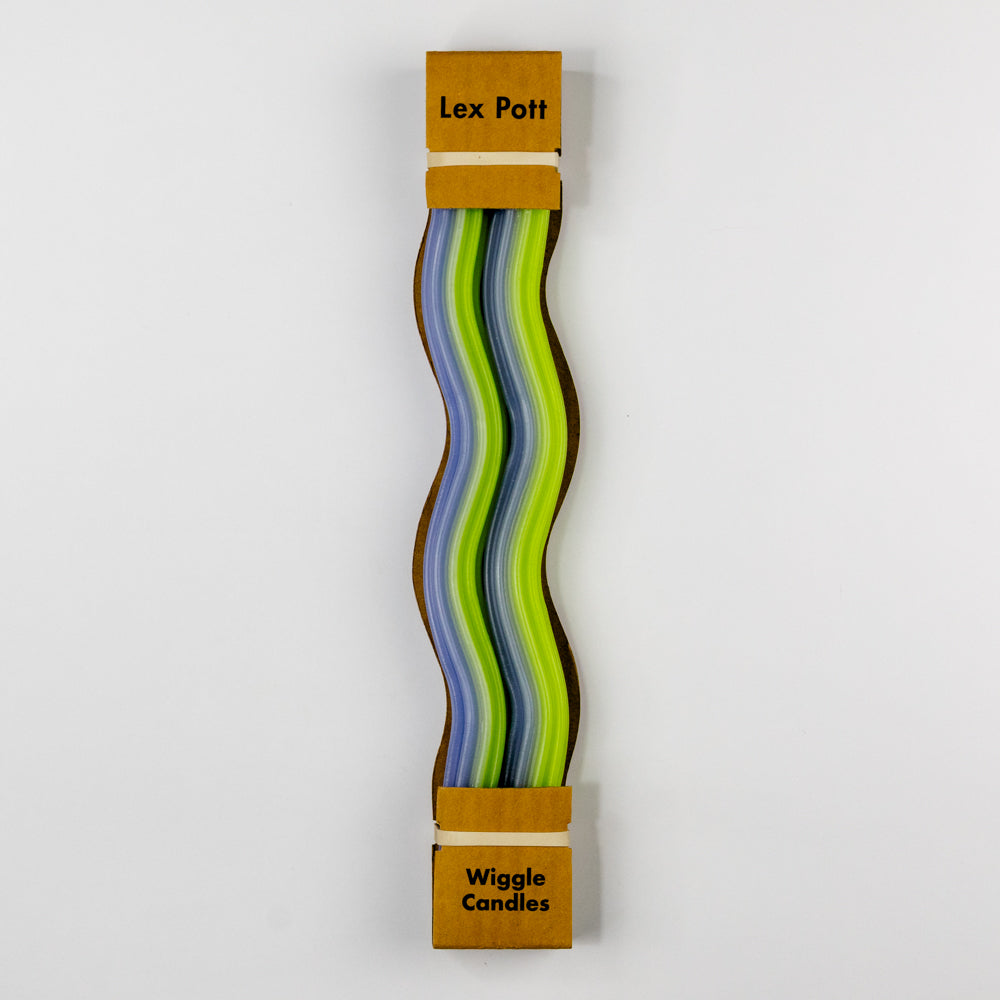 Wiggle candles with colorful wavy design on a white background