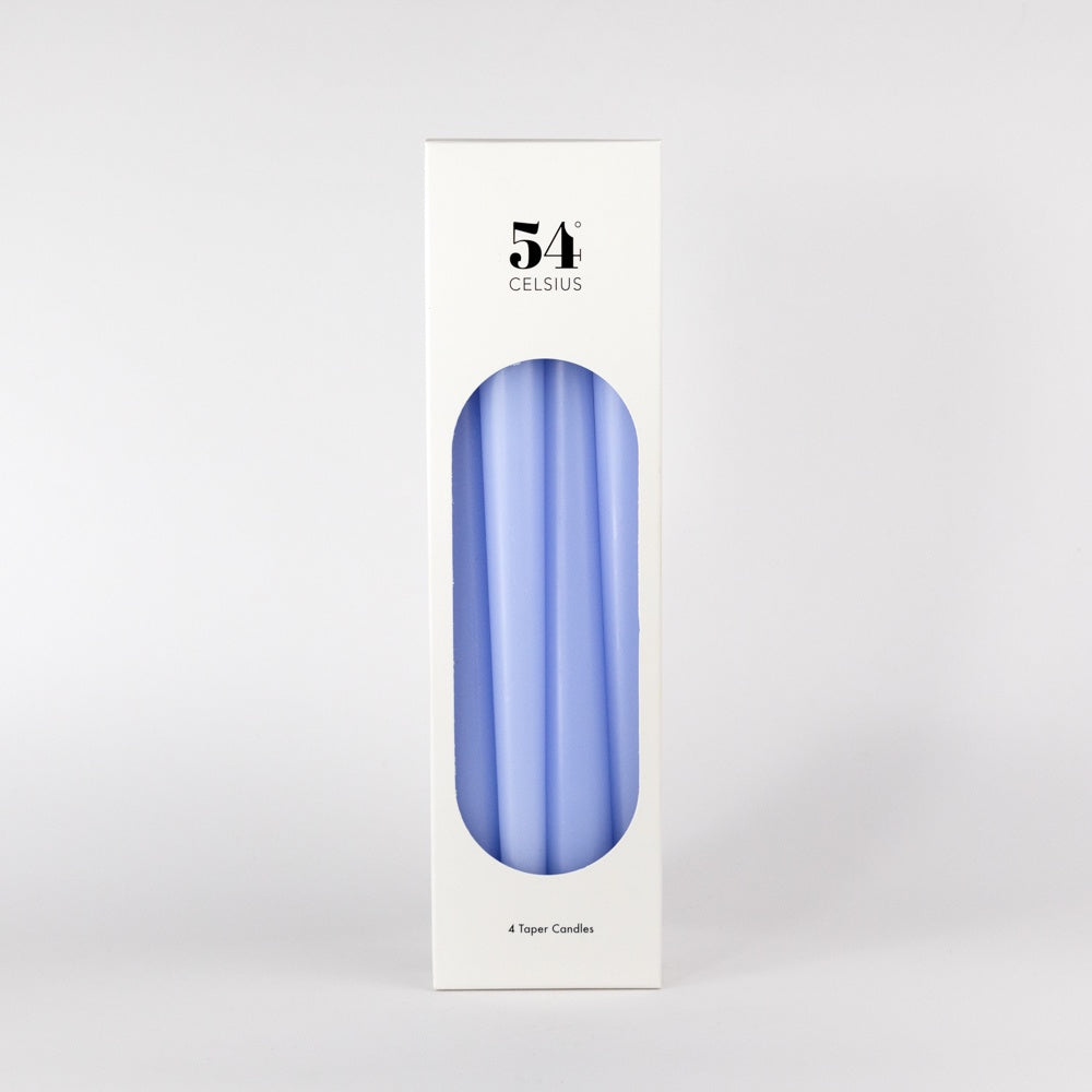 Four lavender candles on a white background