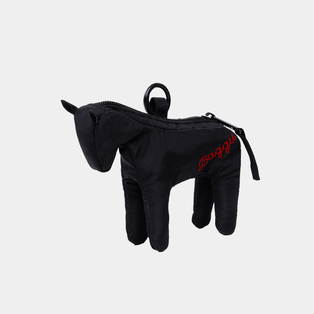 Black horse-shaped bag charm with 'Baggu' branding on a light gray background
