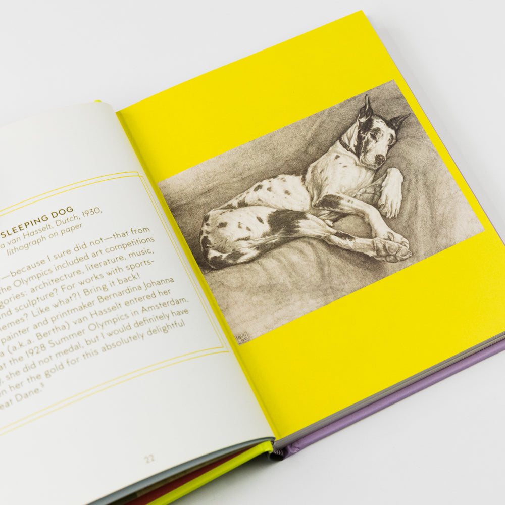 Open book with a yellow cover featuring an illustration of a dog, on a white background