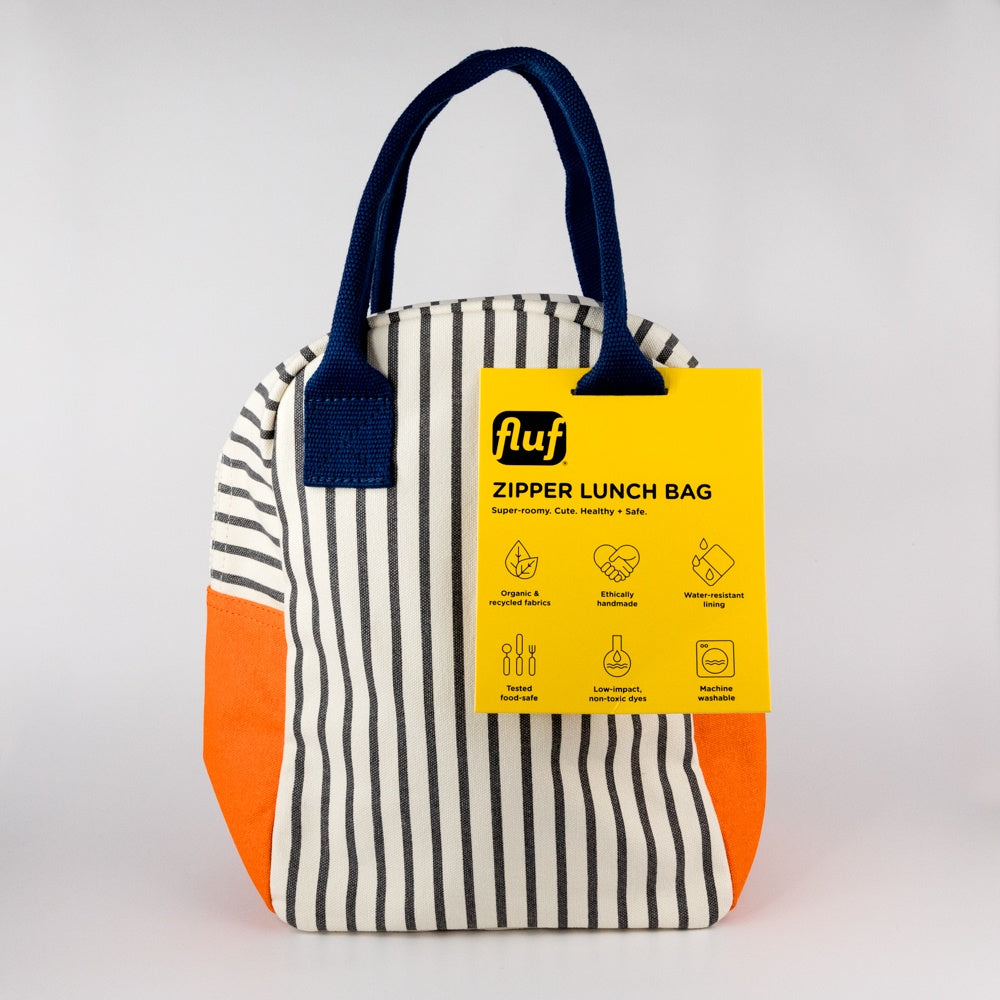 Striped lunch bag with orange bottom and navy handles, featuring a yellow 'fluf' label on a white background.