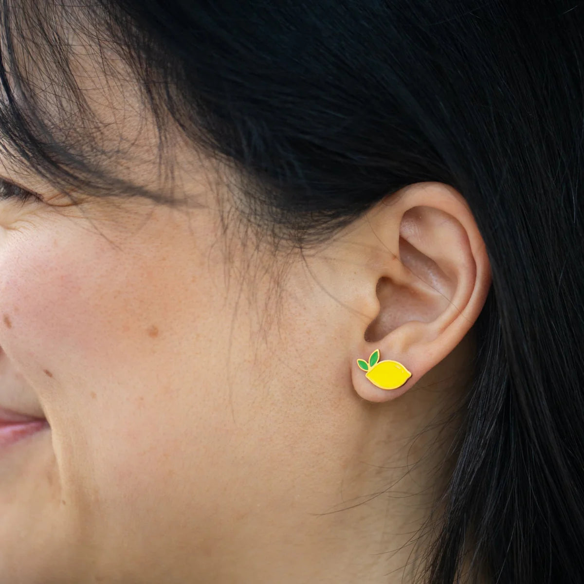 Lemon earrings on a card with 'Maison Chanamon' branding against a white background