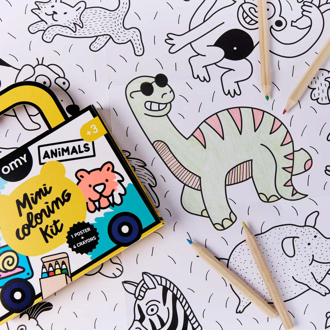 Omy mini coloring kit packaging with cartoon animals on a gray background