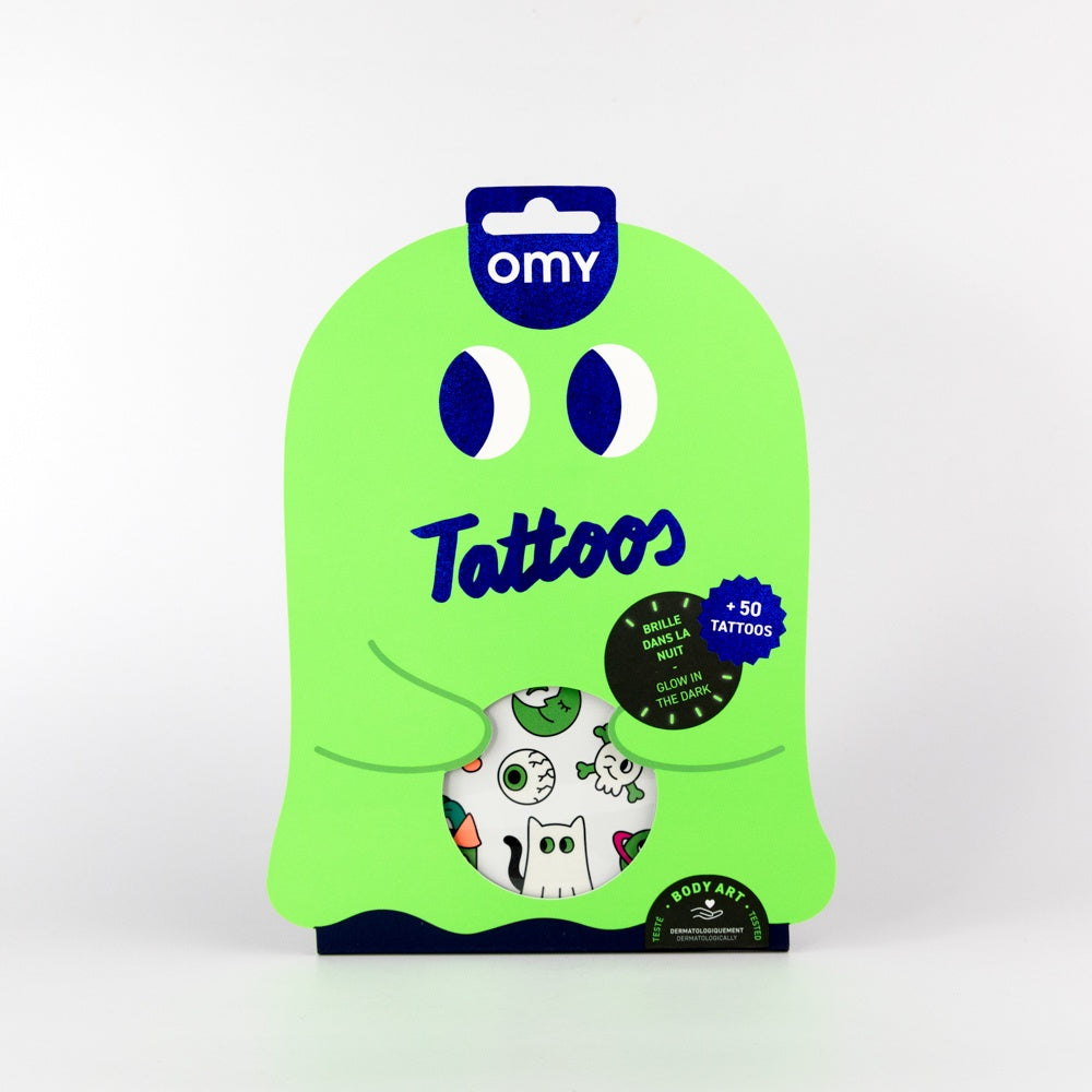 Green packaging of OMY tattoos with cartoon designs on a white background