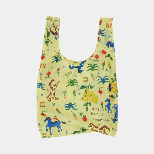 Reusable bag with colorful animal illustrations and text on a light yellow background
