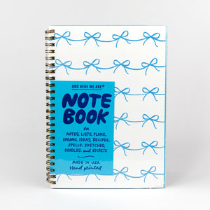 Notebook with blue and white design on a white background