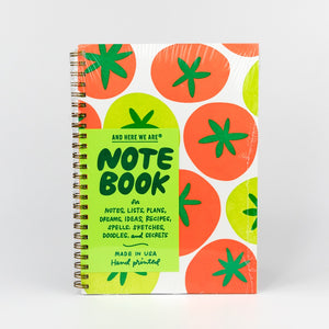 Notebook with tomato design on a white background
