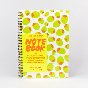 Notebook with green and red pattern on cover