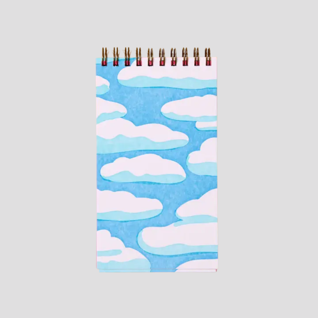 Notebook with cloud pattern on a light gray background
