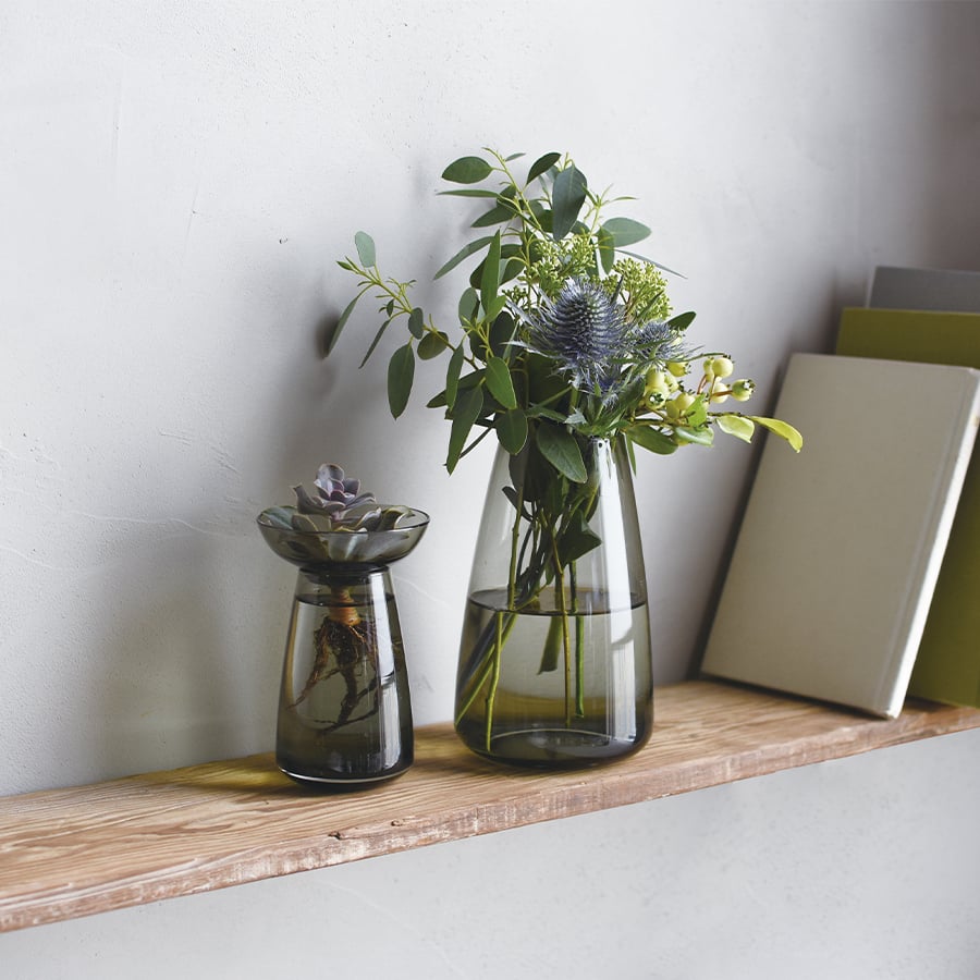 Smoky gray glass vase on a white background