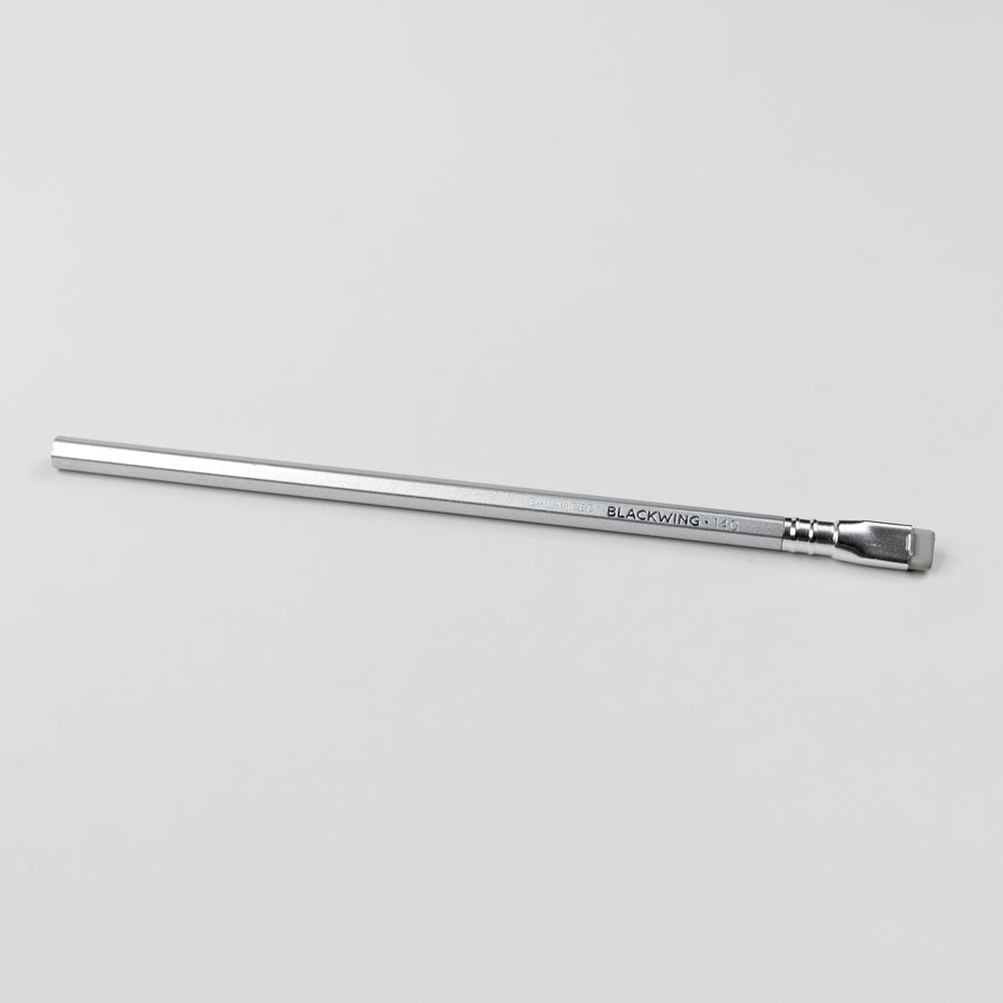 Silver pencil on a light gray background