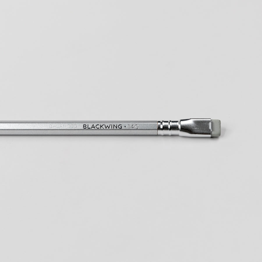Blackwing pencil on a light gray background