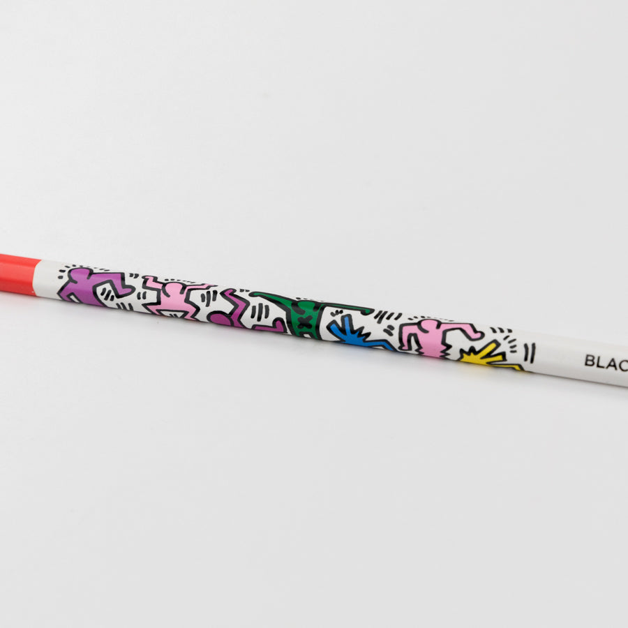Colorful pencil with abstract designs on a white background