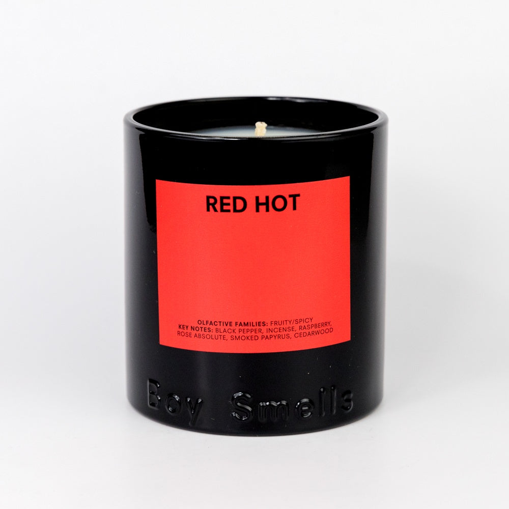 Boy Smells Candle Red Hot