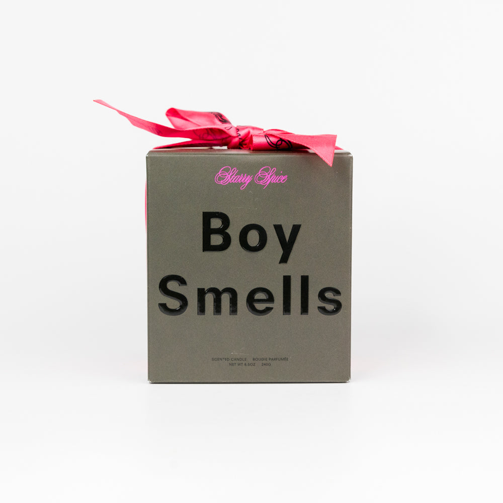 Box with 'Boy Smells' text and a pink bow on a white background
