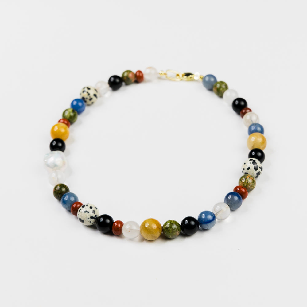 Multicolored beaded necklace on a white background