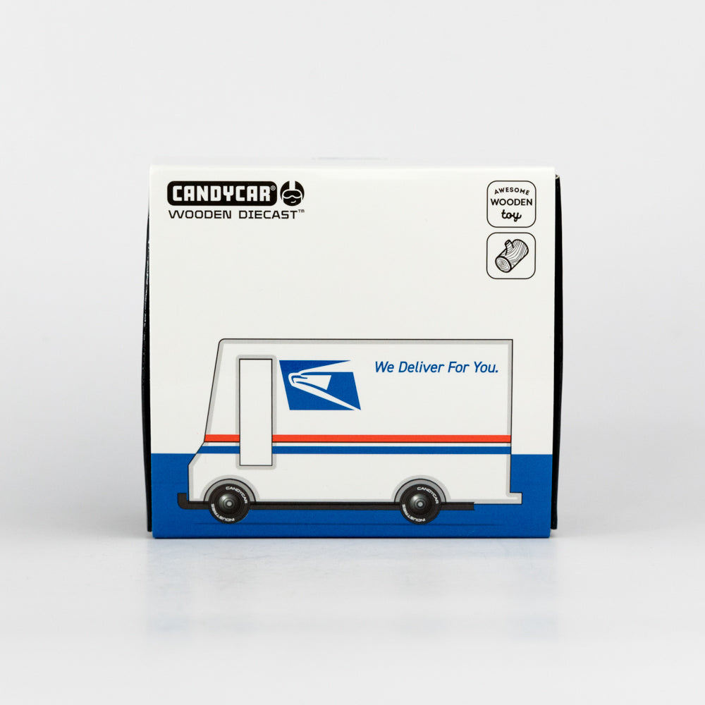 Model toy of a postal truck with USPS logo and 'We Deliver For You.' text on a white background