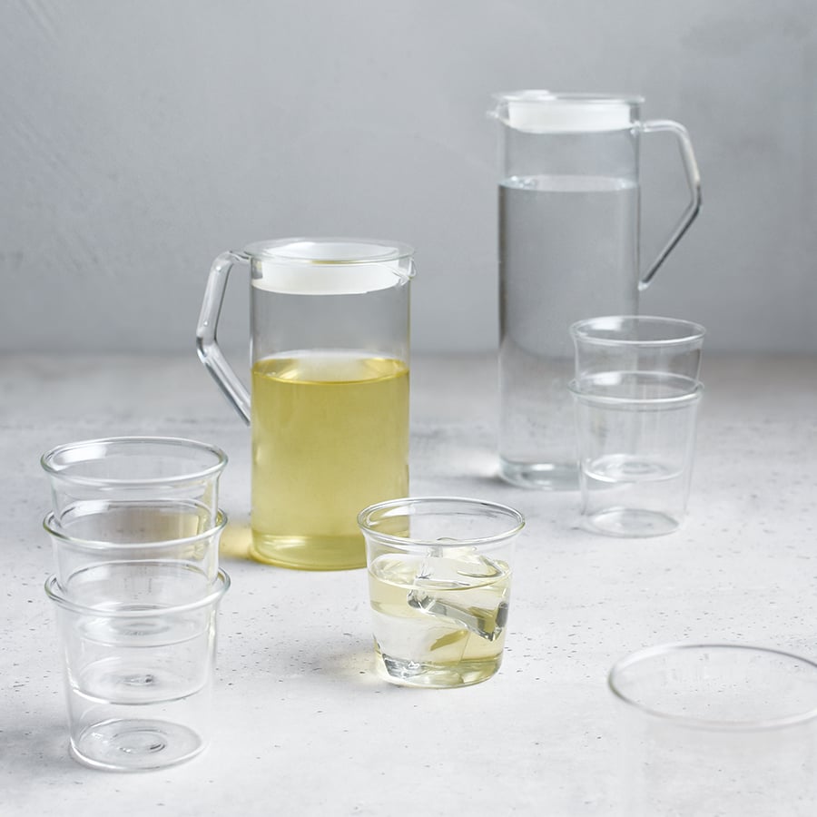 Clear glass pitcher on a white background