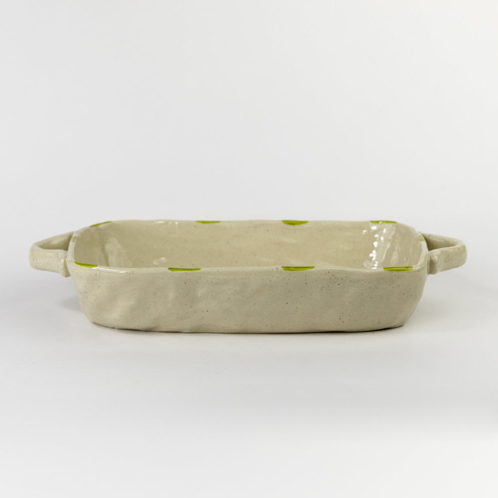 Rectangular ceramic dish with handles on a white background