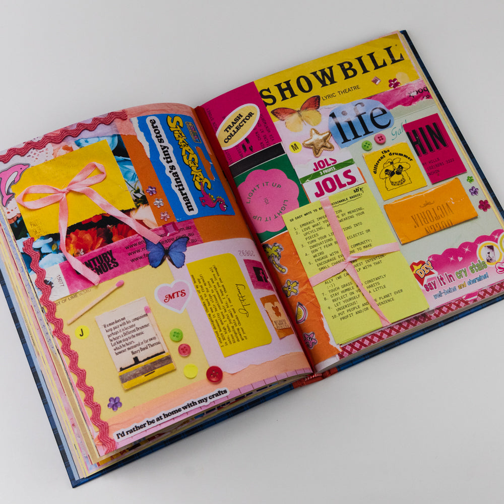 Open book with colorful pages featuring text and graphics on a white background