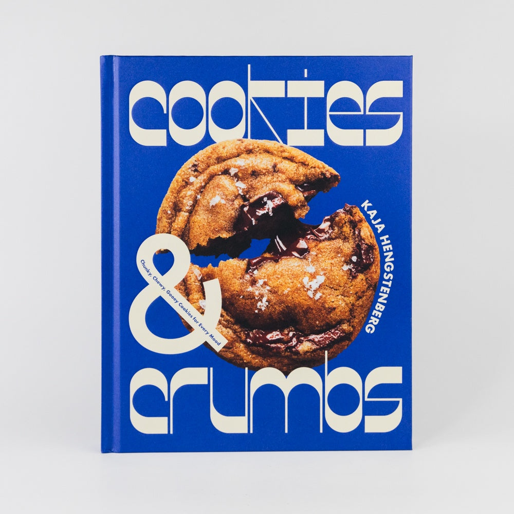 Book titled 'Cookies & Crumbs' with a cookie illustration on a blue background