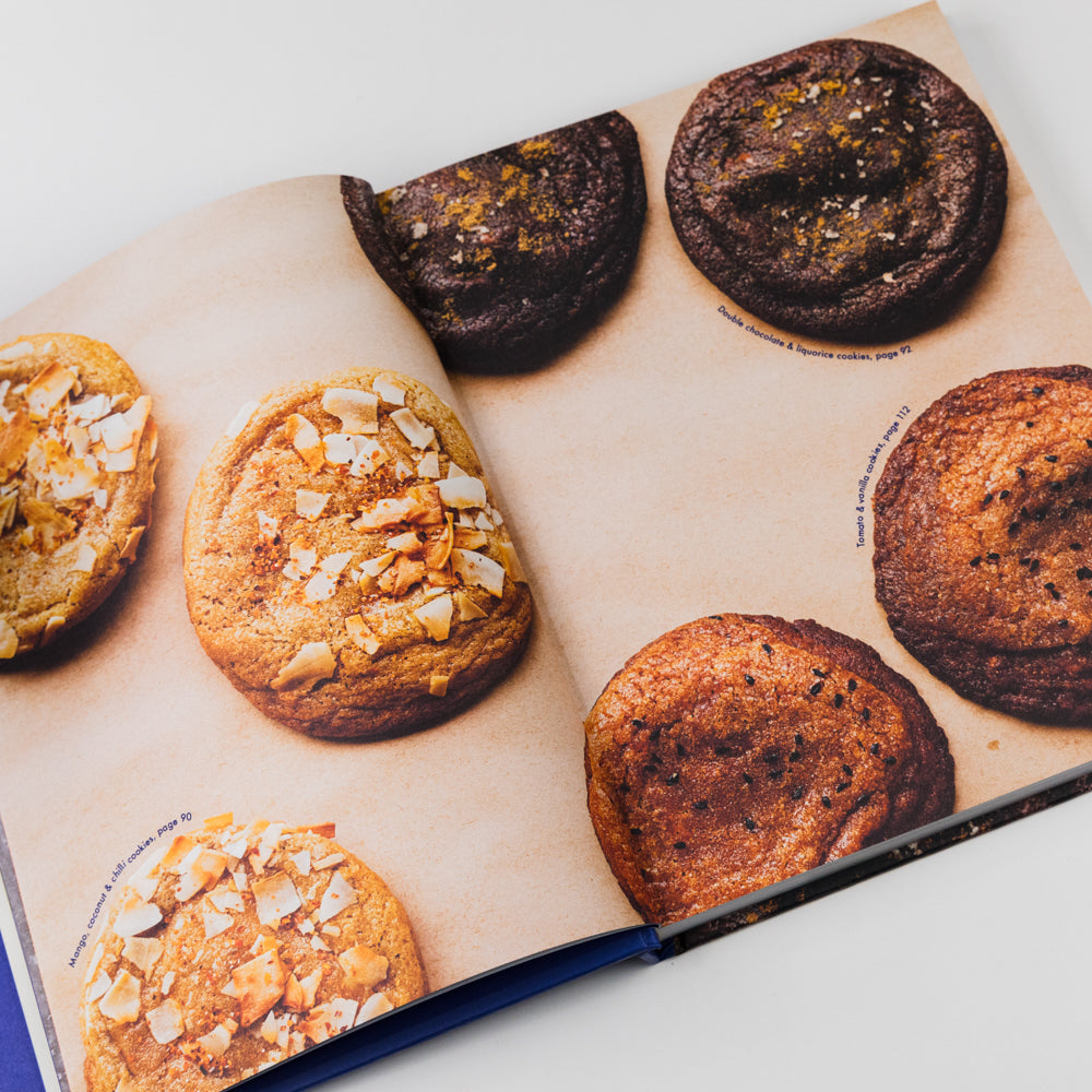 Open book showing images of cookies on a white background