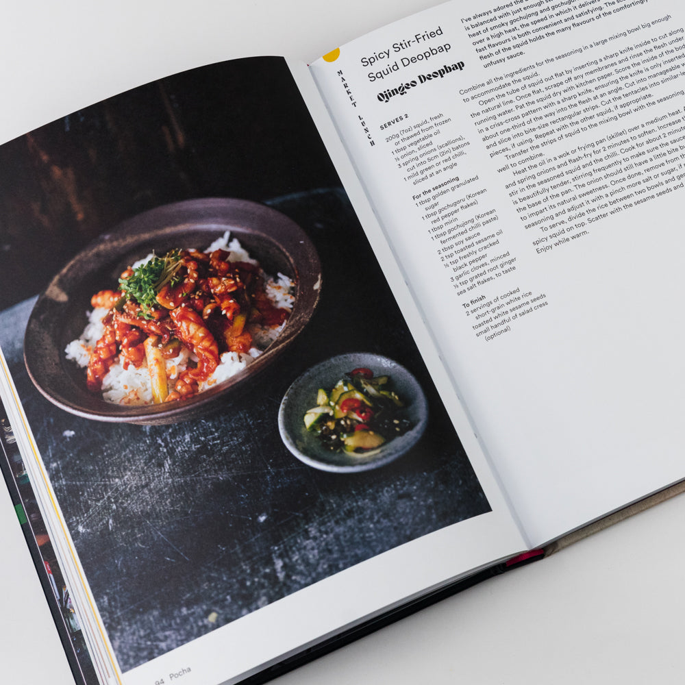 Open cookbook showing a dish with text on a white background