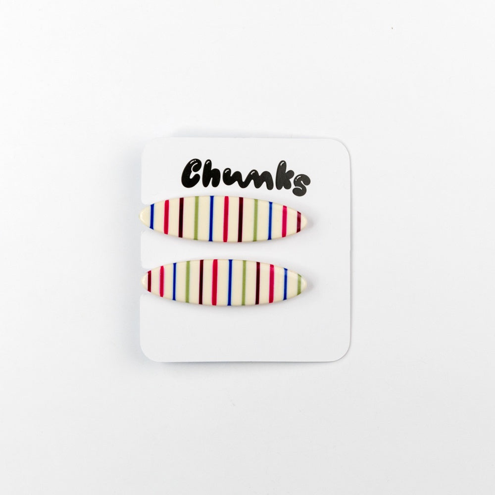 Pair of striped earrings on a 'Chunks' branded card against a white background