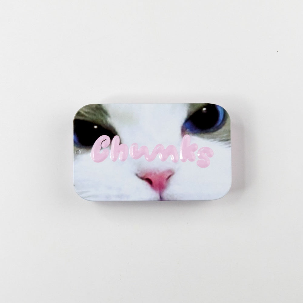 Rectangular tin with a cat's face and 'Chums' text on a white background