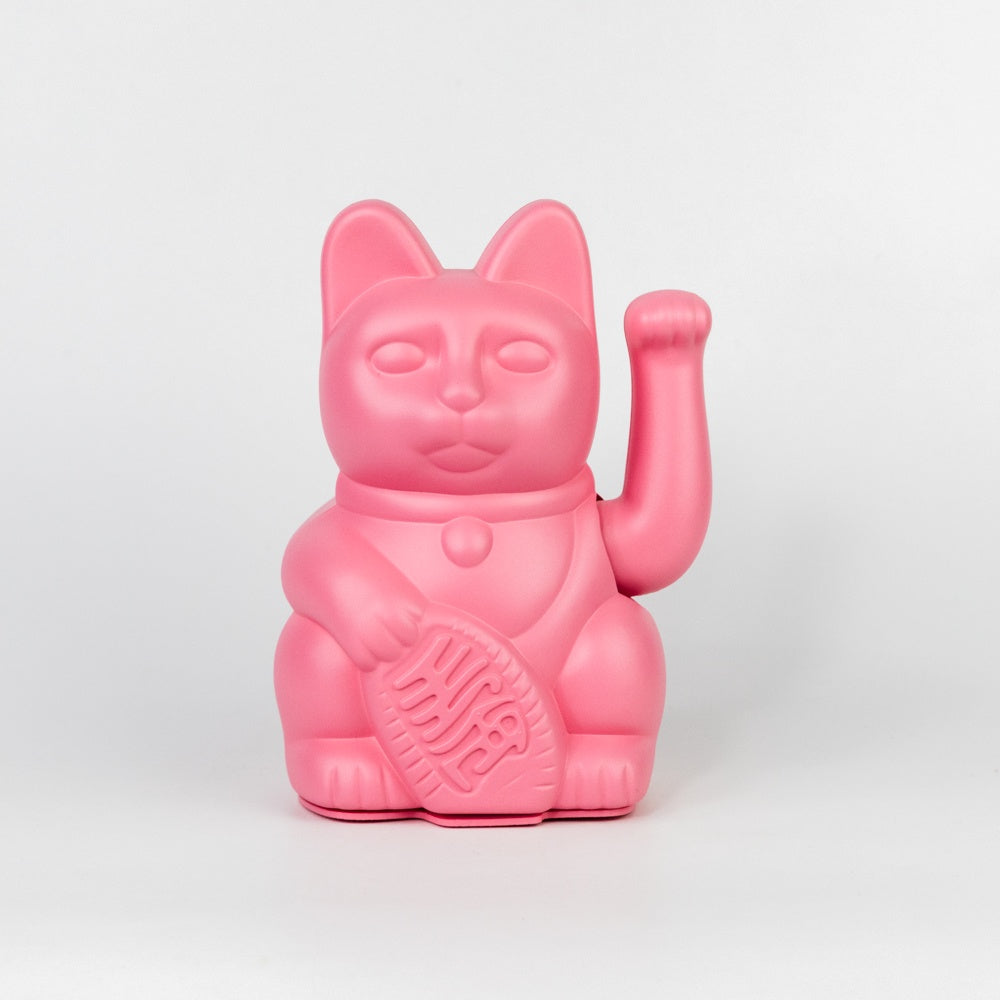 Pink cat-shaped container on a light gray background