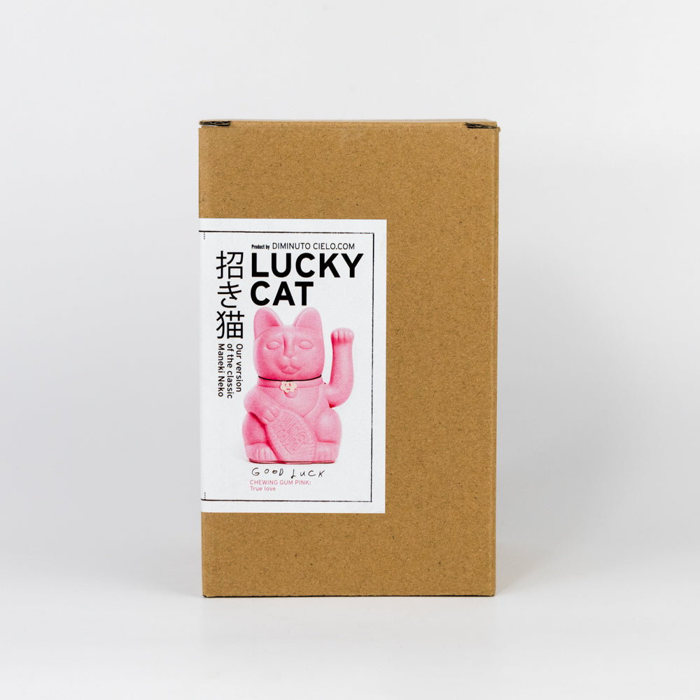 Pink cat-shaped container on a light gray background