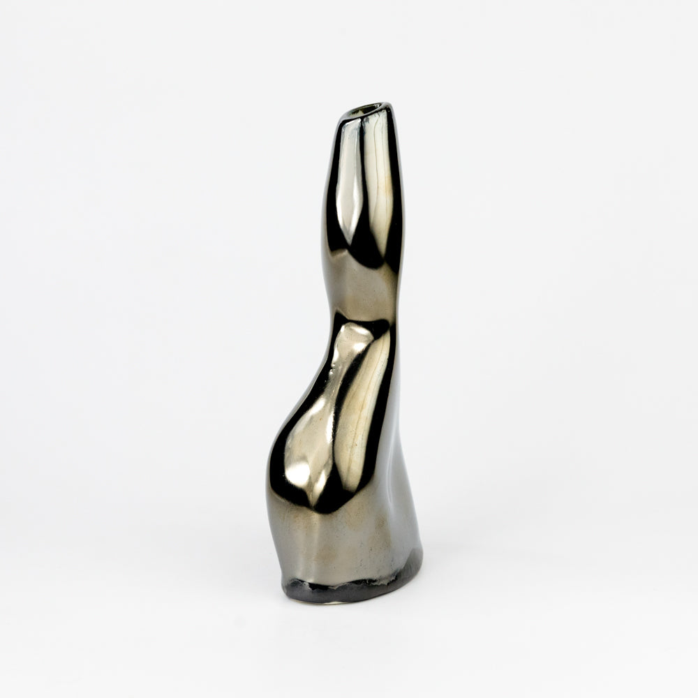 Silver vase with a reflective surface on a white background