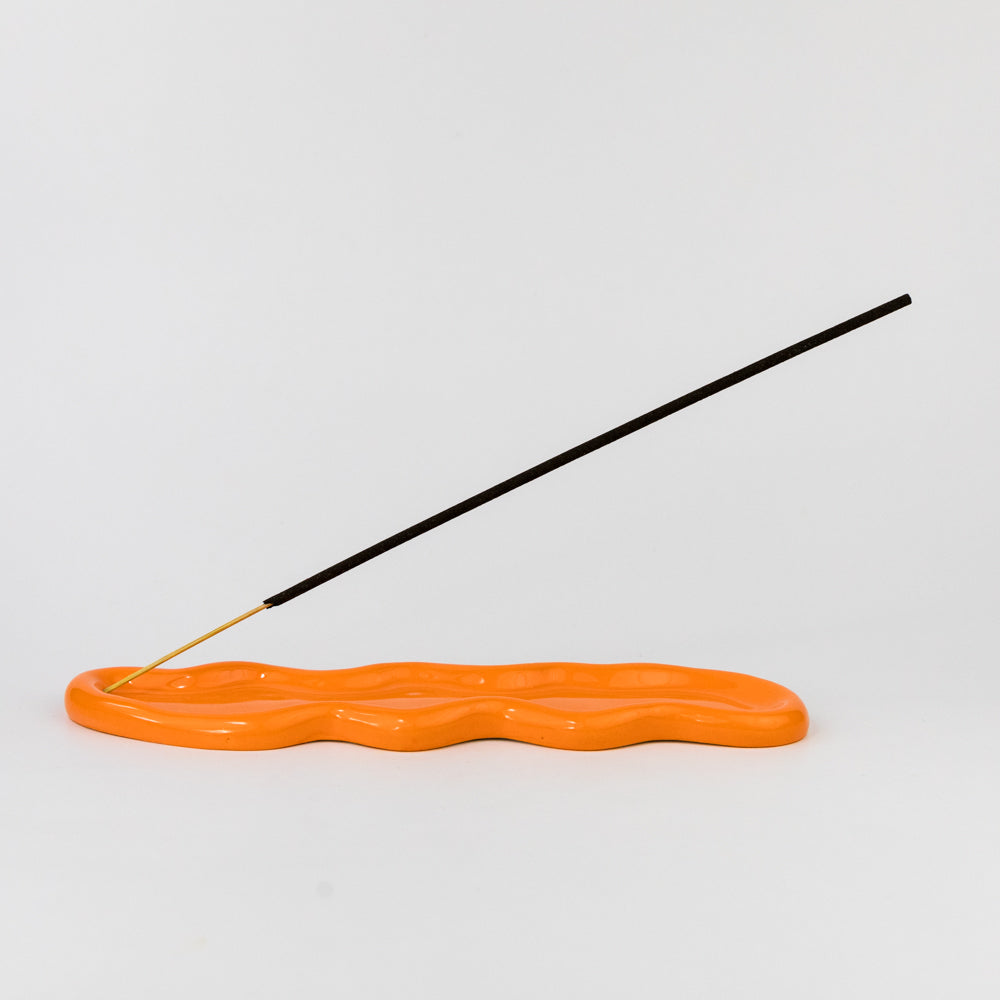 Orange wavy object on a white background