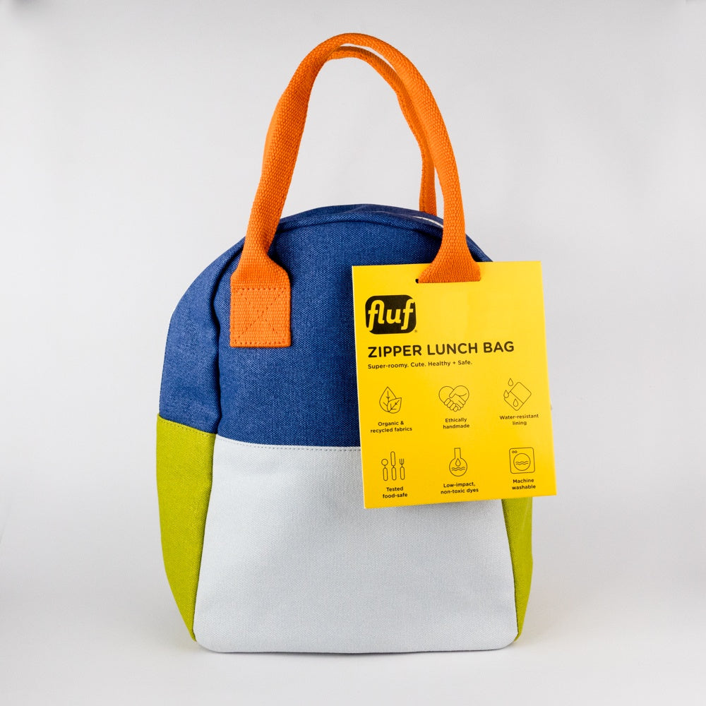 Colorful lunch bag with orange handles and a yellow tag on a white background