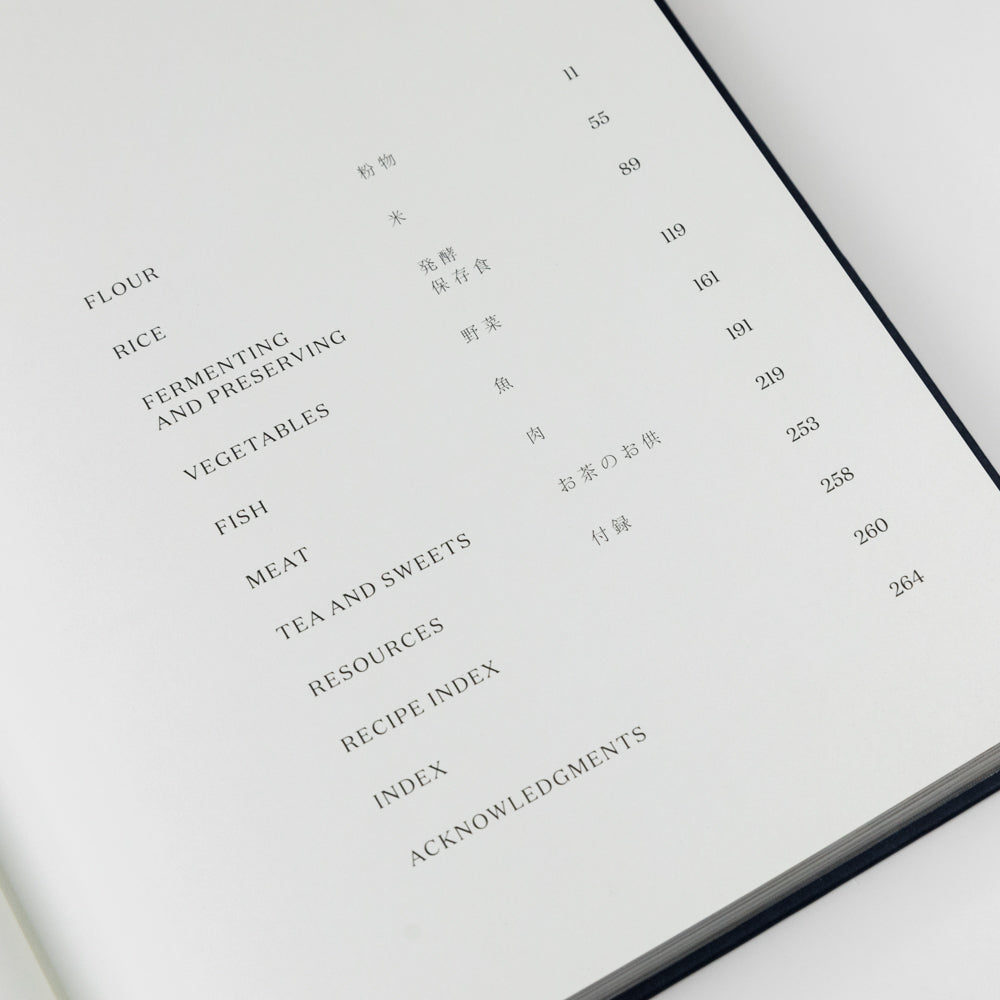 Cookbook titled 'Simply Japanese' with a blue cover and white text on a light gray background