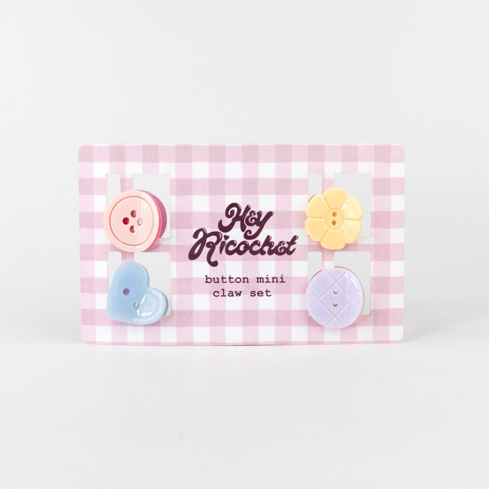 Set of colorful button-shaped mini claws on a pink and white checkered card with 'Hey Ricochet' branding.