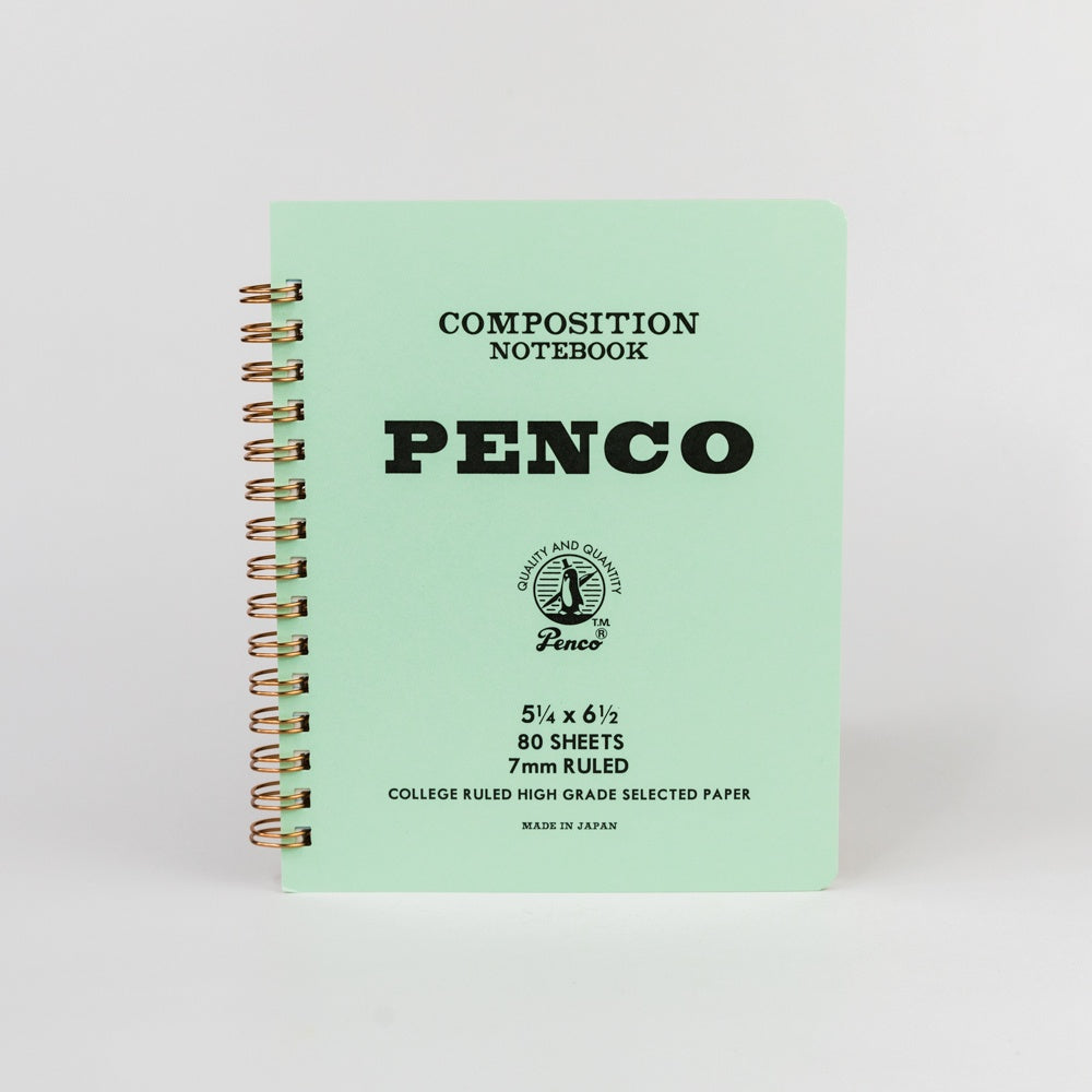 Light green composition notebook with 'Penco' branding on a white background
