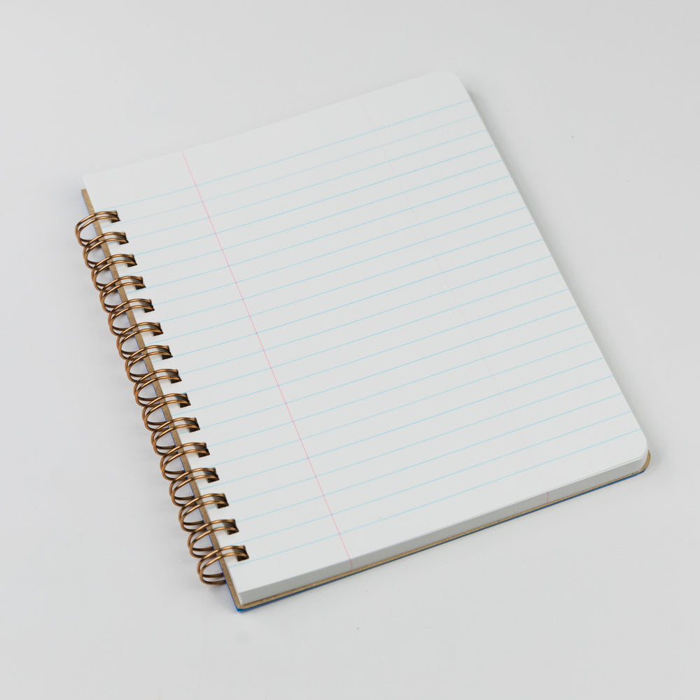 Light green composition notebook with 'Penco' branding on a white background