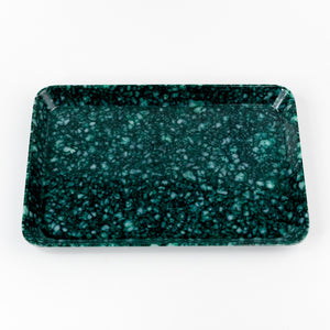 Speckled green rectangular tray on a white background
