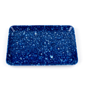 Blue speckled rectangular tray on a white background