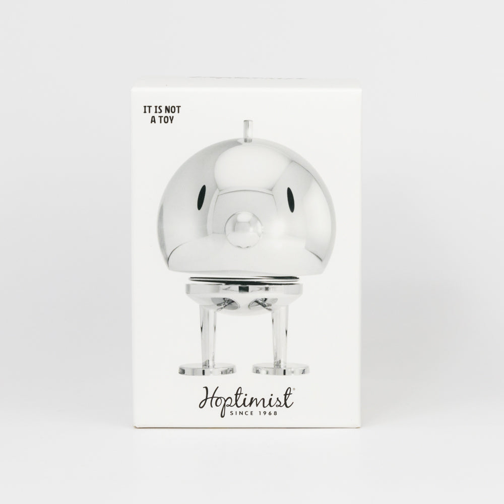 Silver metallic round figure  on a white background